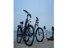 Cut Emissions and Costs: Switch to E-Bikes for City Travel!